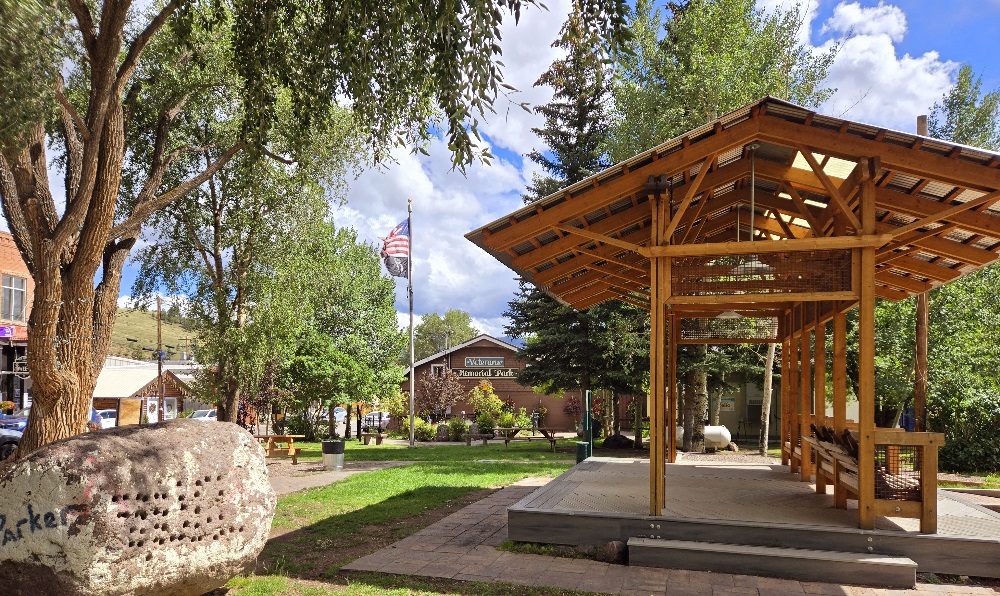 Beautiful photo of Basham Park with its pavilion, memorial park, and green picnic area.